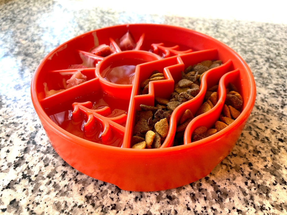 Dog eating from SodaPup Great Outdoors slow feeder bowl — mealtime enrichment